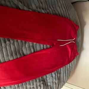 Long and baggy red SHEIN sweats